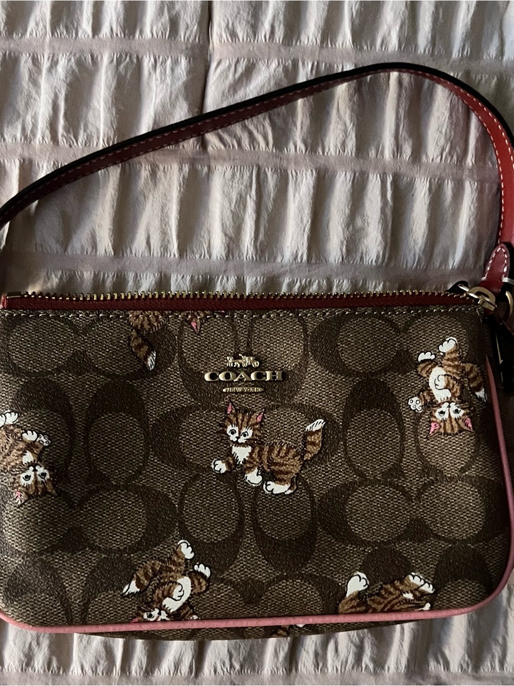 COACH Brown Signature Canvas small purse with Pink Trim and Cat Motif